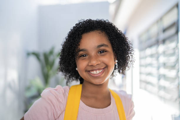 istock Portrait of a happy student at home 1335709950
