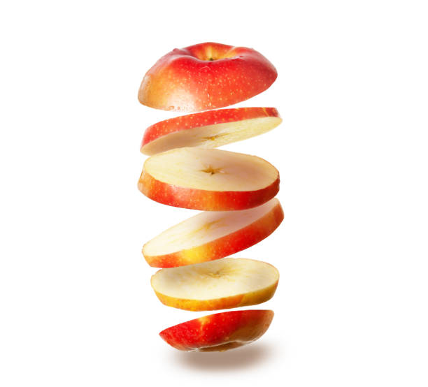 istock levitating sliced red apple isolated on white background 1335712540