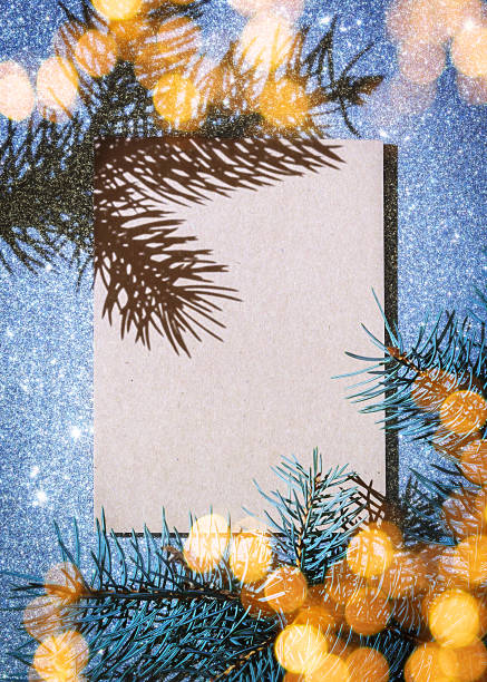 istock Christmas composition. Christmas card with Christmas tree shadows on glittery background. 1335717968