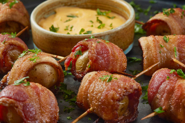 istock Bacon Wrapped Baby Potatoes 1335723512