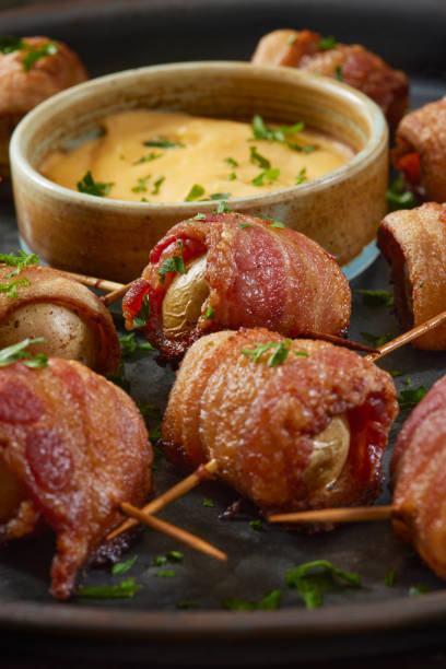 istock Bacon Wrapped Baby Potatoes 1335723602