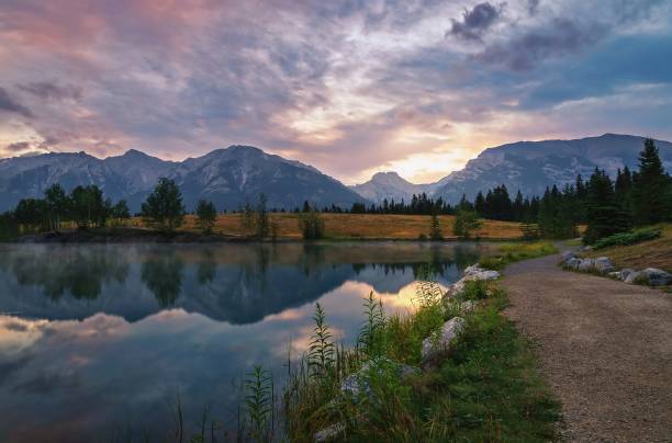 istock Summer Sunrise On Quarry Lake In Canmore 1335729951