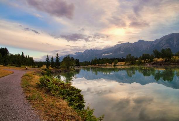 istock Bright Summer Sunrise Over Quarry Lake In Canmore 1335730669