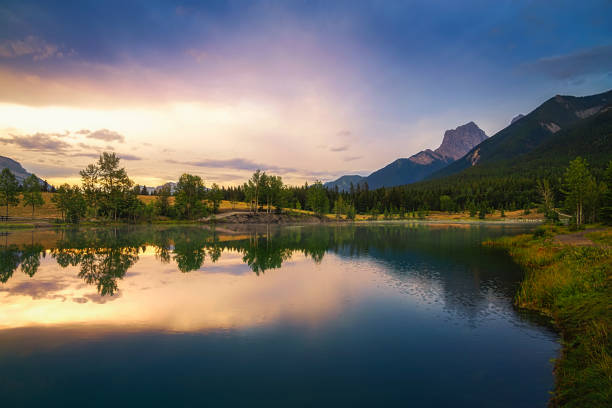 istock Morning Sky Over Quarry Lake Mountains 1335730813