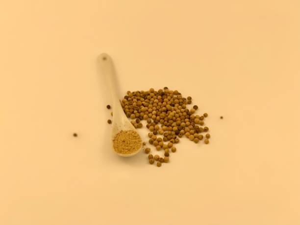 istock Papper seeds and powder with spoon an isolated white background 1335735764