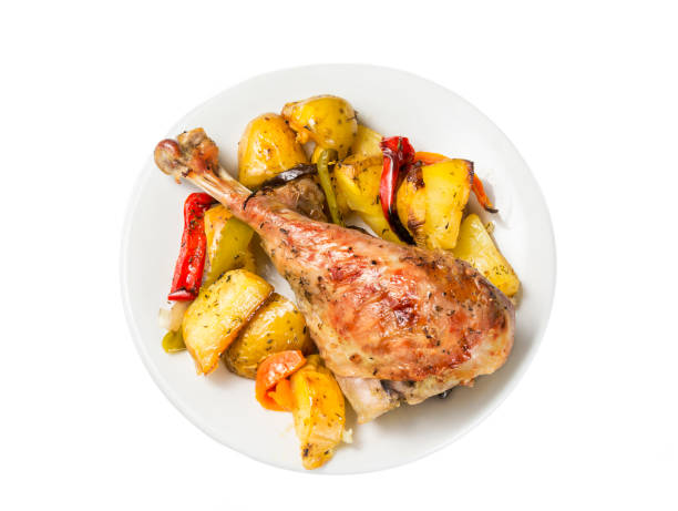 istock Turkey leg with potatoes and vegetables 1335743372