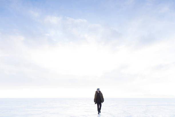 istock Walking on Frozen Water Iceland 1335755998