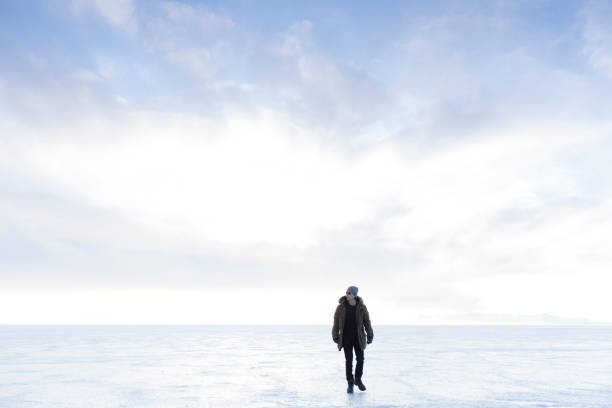 istock Walking on Frozen Water Iceland 1335756000