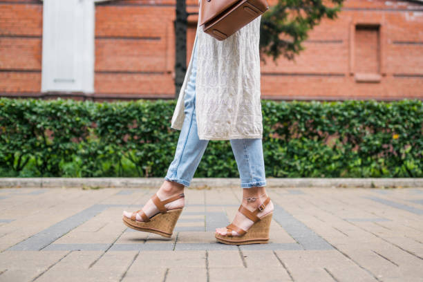 istock Woman walks at the street 1335757421