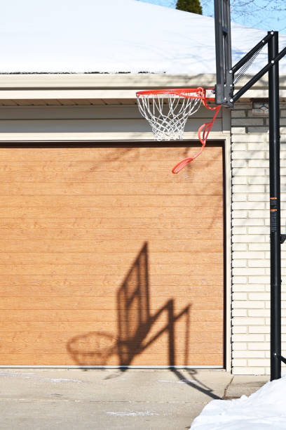 istock Basketball Hoop and Shadow 1335757612