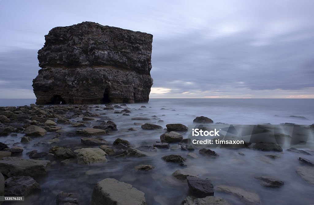 Marsden Rock A long exposure taken at dawn at Marsden Rock, near South Shields, South Tyneside, UK. Beach Stock Photo