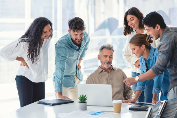 istock Diverse group of business people working. 1335765175