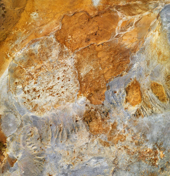istock Abstract mining background, orange and grey colors of copper mine tailings 1335766638
