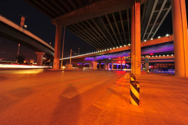 istock Bridge, the city at night 1335771912