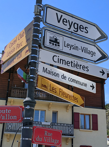 Street and hiking signs in the ski resort of Leysin  spring 2021 Vaud Canton Switzerland