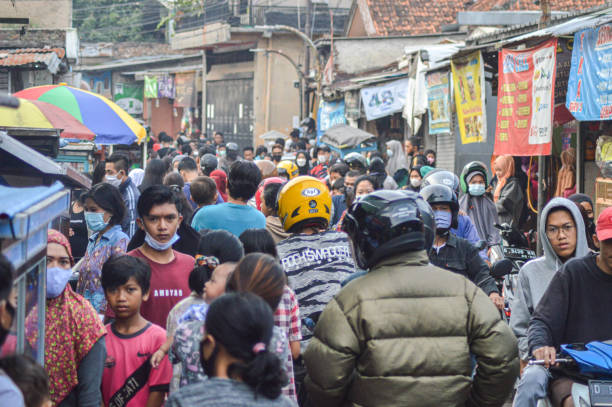 Bandung, Indonesian - April 18, 2021 : People crowded during a pandemic COVID-19
