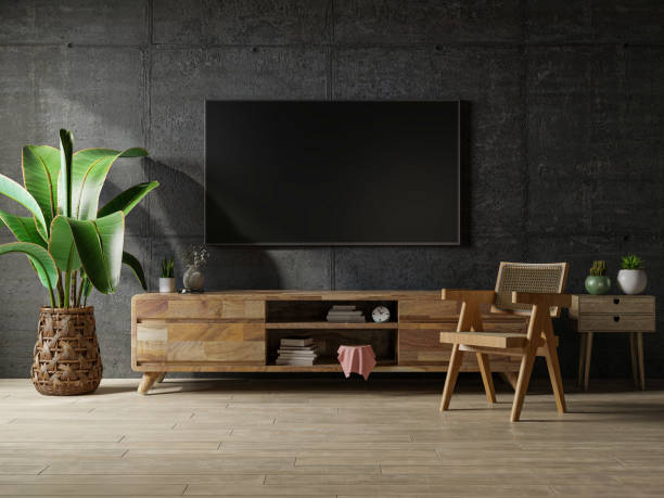 istock Loft space empty room with tv and cabinet on dark concrete interior background. 1335795758