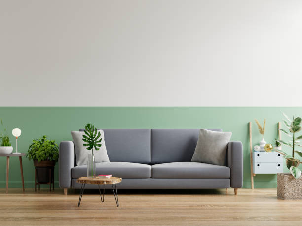 istock Grey sofa in simple living room interior. 1335795766