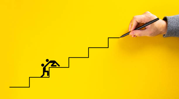 istock Team work for success, hand drawing staircase on yellow background 1335801293