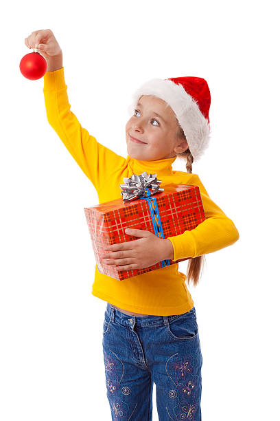 istock Smiling girl in Santa hat with red box 133580182