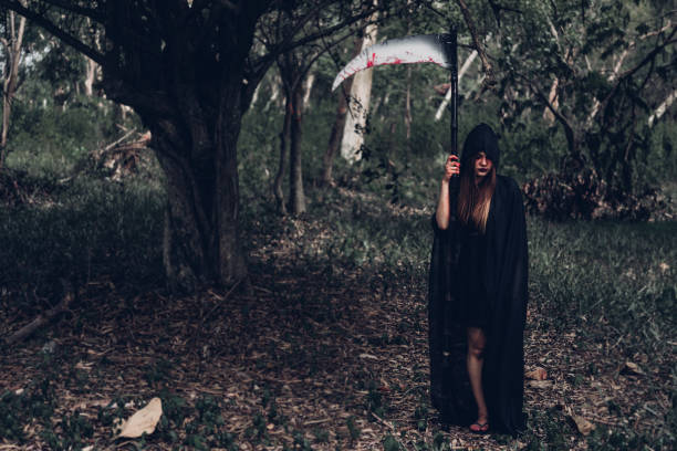 The grim reaper shows a rock and roll sign or an \