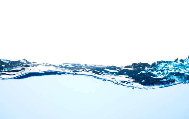 istock Light blue water wave with air bubbles and a little bit splashed underwater 1335810500