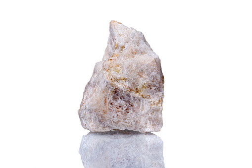macro mineral stone Wollastonite on a white background close-up