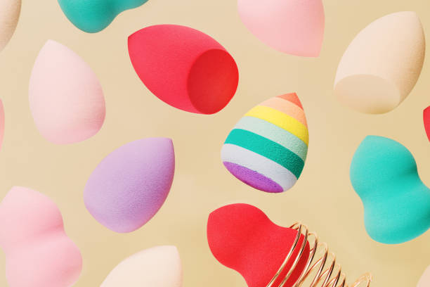 istock Pattern from color cosmetic beauty blender sponges Flying colored sponges different shape. 1335824294