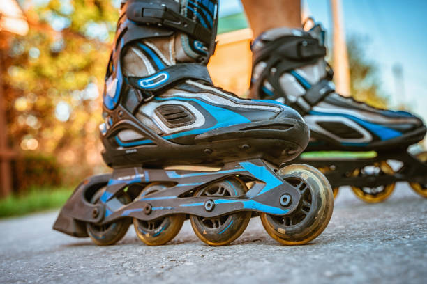 istock Roller skates ride on the asphalt. Active life. 1335825479