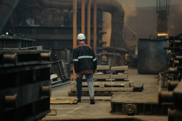 istock Worker in metallurgical plant foundry. Heavy industry 1335828078