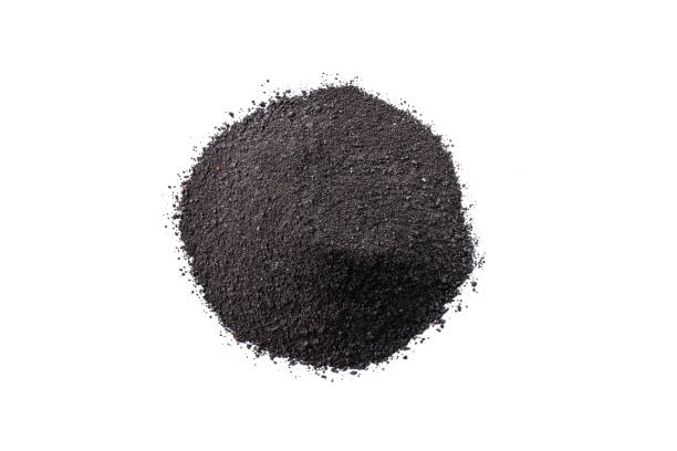 istock Dry black cosmetic clay isolated on white background. 1335833801