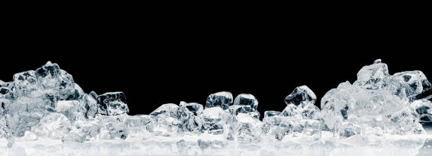 A heap of natural ice cubes on a black background. A heap of natural ice cubes on a black background. Purity and freshness concept background. ice cube photos stock pictures, royalty-free photos & images