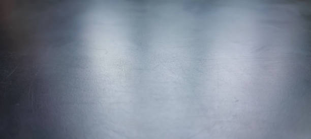 istock Smooth black surface with lots of scratches and reflects light 1335836934