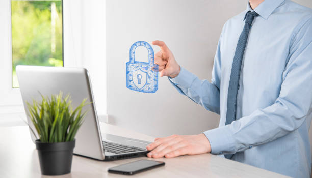 istock Male hand holding a lock padlock icon.Cyber security network. Internet technology networking.Protecting data personal information on tablet. Data protection privacy concept. GDPR. EU.Banner 1335838014
