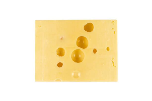 Maasdam cheese block isolated on white background with clipping path. Closeup view of a piece of maasdam cheese. Piece of delicious fresh cheese. Maasdam cheese block isolated on white background with clipping path. Closeup view of a piece of maasdam cheese. Piece of delicious fresh cheese. edam stock pictures, royalty-free photos & images
