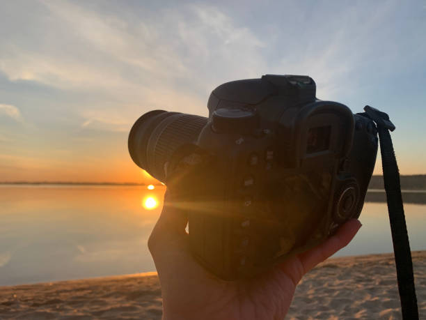 istock Taking photos of sunset 1335846053
