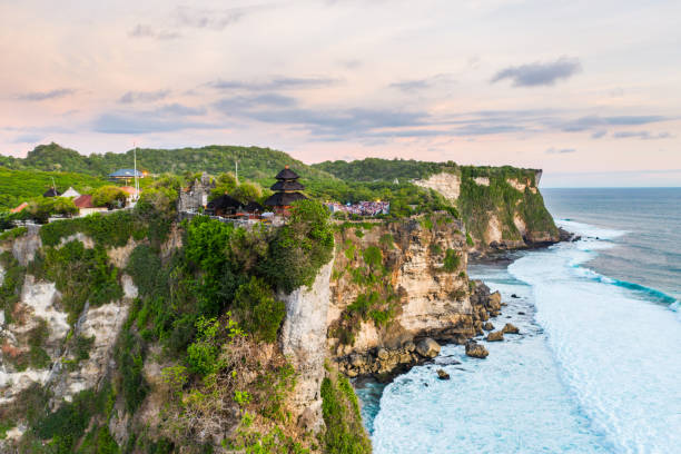 istock Bali, Sunset in Uluwatu. Blue ocean and cliffs. 1335848013