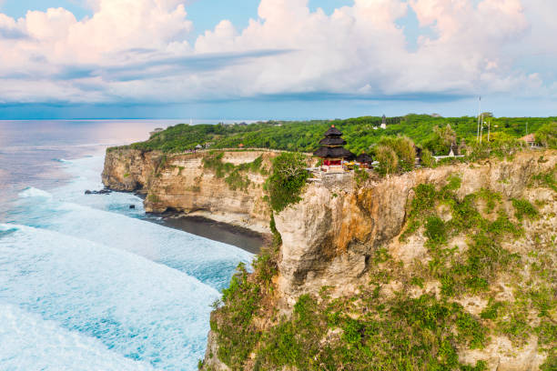 istock Bali, Sunset in Uluwatu. Blue ocean and cliffs. 1335848018