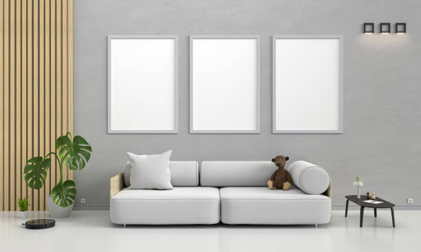 istock White living room and sofa with frames mockup, 3D rendering 1335848771