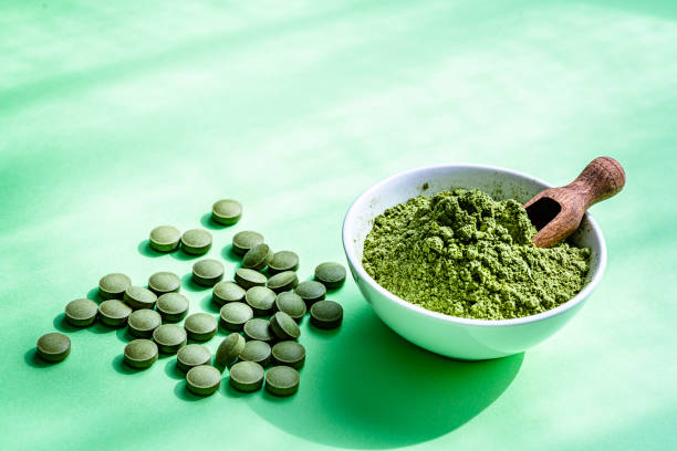istock Nutritional supplement: Moringa oleifera powder and pills 1335854727
