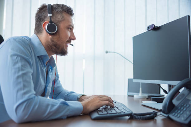 istock Businessman making video call, negotiating excitedly 1335857936