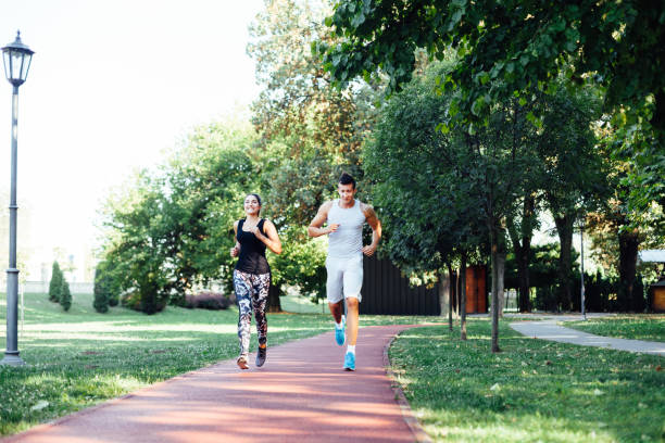 istock Couple Jogging Together 1335860445