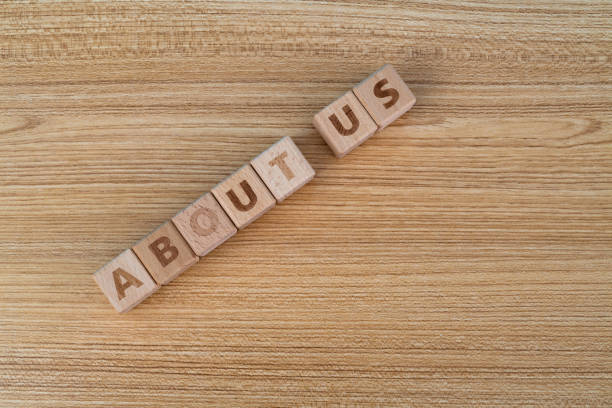 istock Wooden block shapes with word about us 1335863292