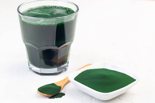 istock Superfood chlorella in powder and as drink, horizontal, copy space 1335863474