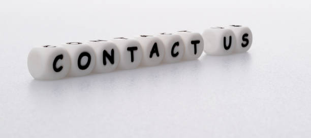 istock Block shapes with word contact us on white background 1335863483
