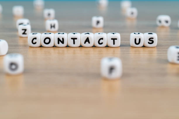 istock Block shapes with word contact us 1335863487
