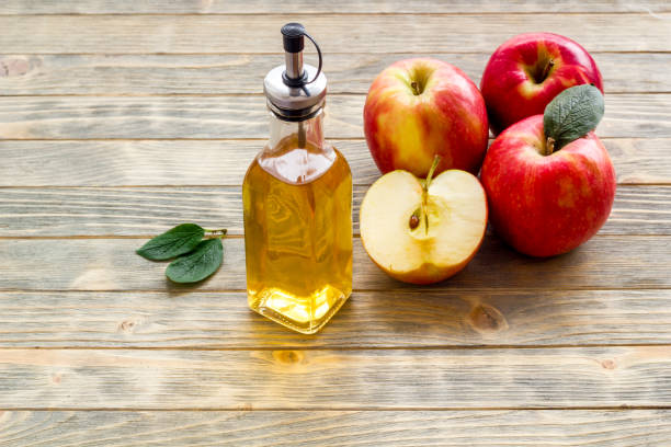 istock Apple cider vinegar for cooking with red raw apples 1335868046
