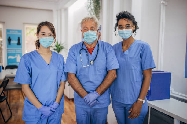 istock Medical workers at vaccination center 1335868249