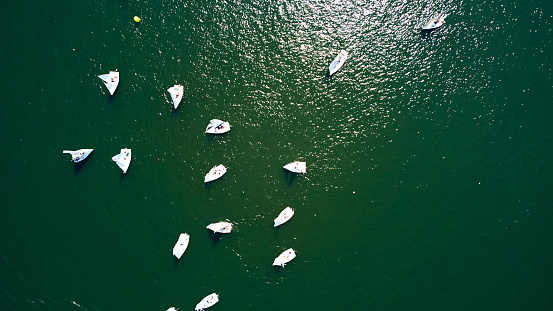 Drone view of river and boats at summertime.