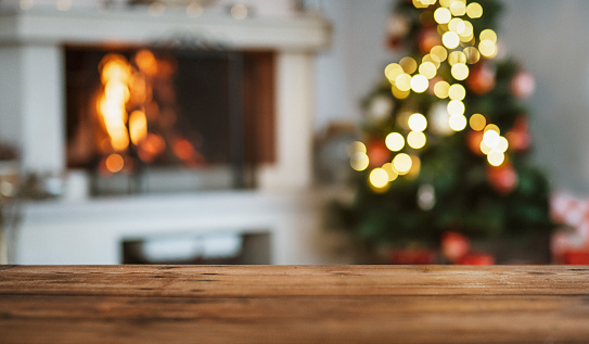 Beautiful Christmas decoration at home, fireplace with tree